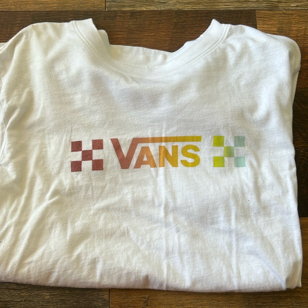 White long sleeve. Cuffed at hands. Rainbow vans logo